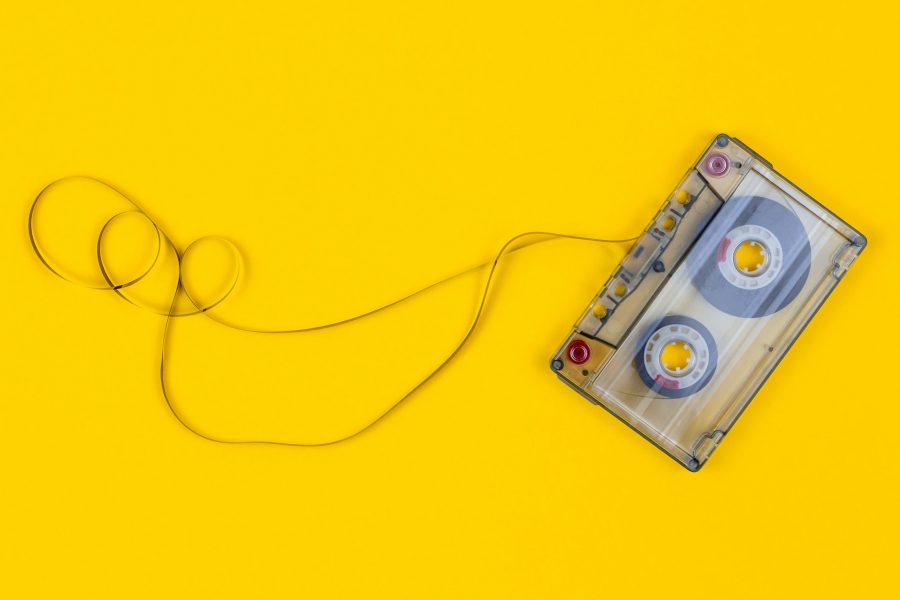 Music cassette on a yellow background.
