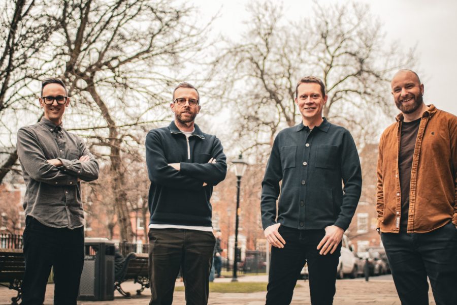 “HyperFinity founders celebrating 2025 successes – group photo of the four co-founders driving retail decision intelligence innovation.”